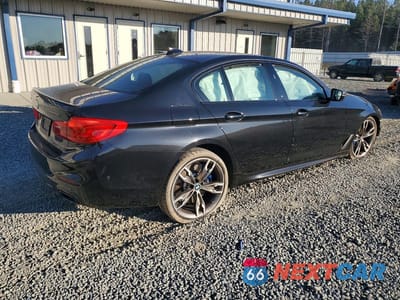 Trzecie zdjęcie samochodu z tyłu: 2020 BMW M550XI VIN:WBAJS7C06LCD00163 - miniatura
