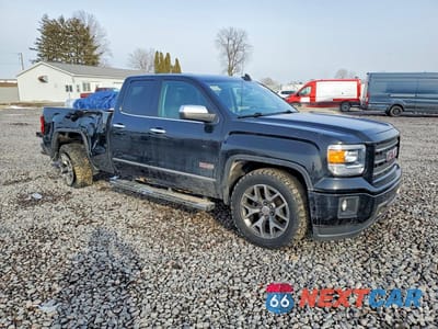 Czwarte zdjęcie samochodu z boku: 2015 GMC SIERRA K1500 SLE VIN:1GTV2UEC2FZ345495 - miniatura