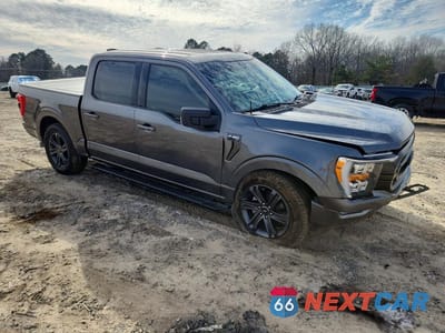 Czwarte zdjęcie samochodu z boku: 2023 FORD F150 SUPERCREW VIN:1FTFW1E81PKD03557 - miniatura