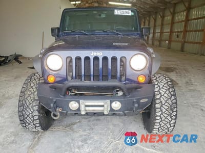 Piąte zdjęcie samochodu w środku: 2013 JEEP WRANGLER UNLIMITED SPORT VIN:1C4BJWDG5DL558558 - miniatura