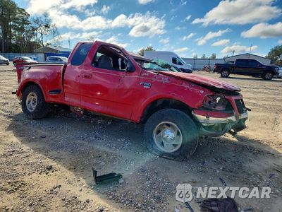 Czwarte zdjęcie samochodu z boku: 2000 FORD F150 VIN:1FTRX08LXYKA05403 - miniatura