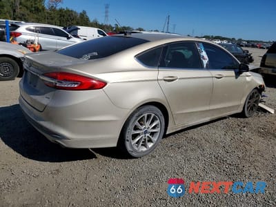 Trzecie zdjęcie samochodu z tyłu: 2017 FORD FUSION SE VIN:3FA6P0H72HR200371 - miniatura