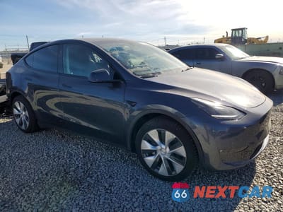Czwarte zdjęcie samochodu z boku: 2023 TESLA MODEL Y VIN:7SAYGAEE5PF810862 - miniatura