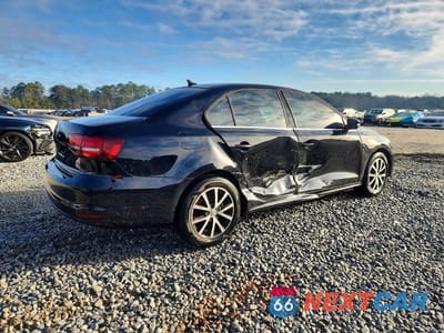 Trzecie zdjęcie samochodu z tyłu: 2017 VOLKSWAGEN JETTA SE VIN:3VWDB7AJ8HM296354 - miniatura