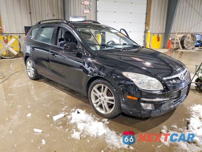 Czwarte zdjęcie samochodu z boku: 2010 HYUNDAI ELANTRA TOURING SE VIN:KMHDC8AE1AU072901 - miniatura