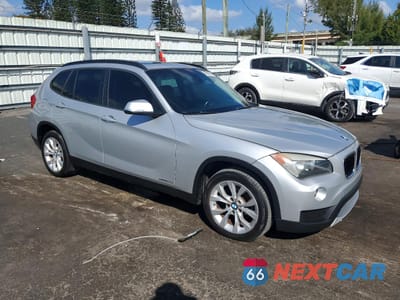Czwarte zdjęcie samochodu z boku: 2014 BMW X1 XDRIVE28I VIN:WBAVL1C57EVY14552 - miniatura