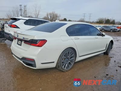 Trzecie zdjęcie samochodu z tyłu: 2020 BMW 750 XI VIN:WBA7U2C08LGJ59237 - miniatura