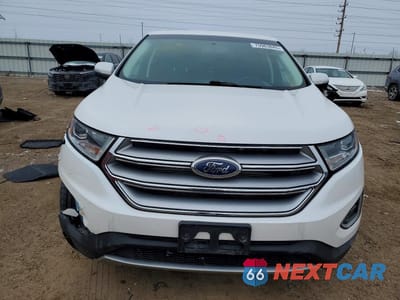 Piąte zdjęcie samochodu w środku: 2016 FORD EDGE TITANIUM VIN:2FMPK4K88GBB90394 - miniatura