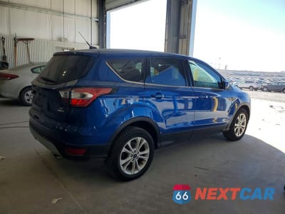 Trzecie zdjęcie samochodu z tyłu: 2017 FORD ESCAPE SE VIN:1FMCU9GD7HUD28451 - miniatura