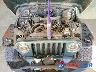 Zdjęcie 11 z 12 samochodu: 2000 JEEP WRANGLER / TJ SPORT VIN:1J4FA49S2YP710100 - miniatura
