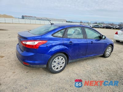 Trzecie zdjęcie samochodu z tyłu: 2012 FORD FOCUS SE VIN:1FAHP3F20CL457912 - miniatura