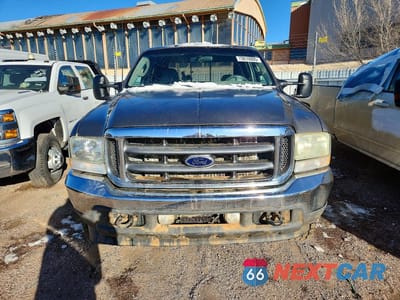 Piąte zdjęcie samochodu w środku: 2003 FORD F250 FLATBED TRUCK VIN:1FTNW21S23EA53127 - miniatura