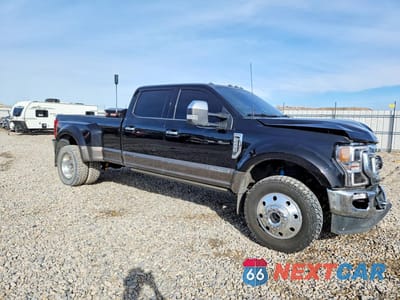 Czwarte zdjęcie samochodu z boku: 2021 FORD F450 SUPER DUTY VIN:1FT8W4DT5MED78000 - miniatura