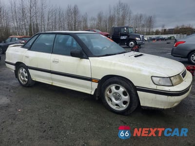 Czwarte zdjęcie samochodu z boku: 1993 SUBARU LEGACY SPORT VIN:JF1BC6734PG602538 - miniatura