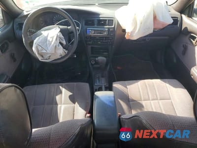 Zdjęcie 8 z 11 samochodu: 1995 TOYOTA COROLLA VIN:1NXAE04B1SZ280472 - miniatura