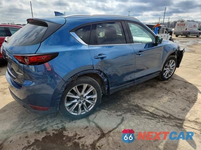 Trzecie zdjęcie samochodu z tyłu: 2021 MAZDA CX-5 GRAND TOURING VIN:JM3KFBDM2M0462055 - miniatura