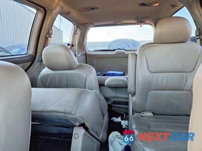Zdjęcie 10 z 13 samochodu: 2002 HONDA ODYSSEY EXL VIN:2HKRL18002H560048 - miniatura