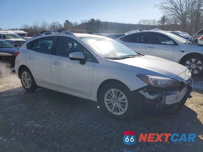 Czwarte zdjęcie samochodu z boku: 2017 SUBARU IMPREZA PREMIUM VIN:4S3GTAB66H3731829 - miniatura