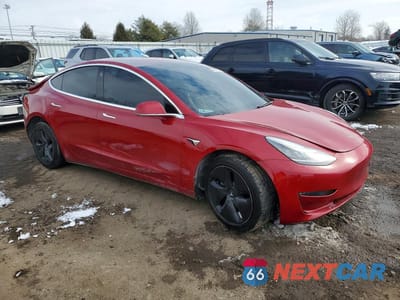 Czwarte zdjęcie samochodu z boku: 2018 TESLA MODEL 3 VIN:5YJ3E1EB3JF088110 - miniatura