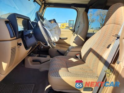 Zdjęcie 7 z 13 samochodu: 1999 JEEP WRANGLER / TJ SPORT VIN:1J4FY19S0XP407289 - miniatura
