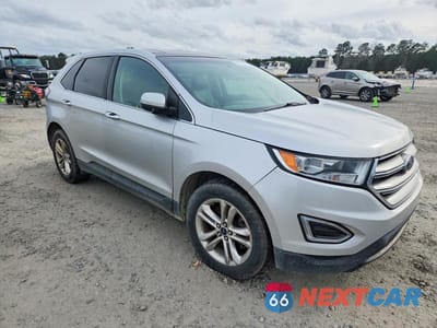 Czwarte zdjęcie samochodu z boku: 2015 FORD EDGE TITANIUM VIN:2FMTK4K99FBB32087 - miniatura