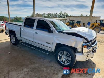 Czwarte zdjęcie samochodu z boku: 2017 CHEVROLET SILVERADO K1500 HIGH COUNTRY VIN:3GCUKTEJ8HG384292 - miniatura
