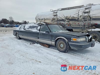 Czwarte zdjęcie samochodu z boku: 1995 LINCOLN TOWN CAR EXECUTIVE VIN:1LNLM81W8SY729429 - miniatura