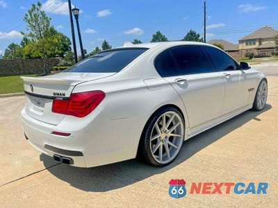 Czwarte zdjęcie samochodu z boku: 2010 BMW 750 LI VIN:WBAKB8C58ACY64395 - miniatura