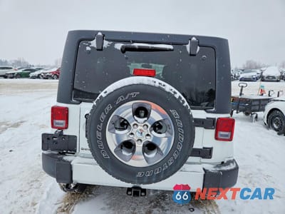 Zdjęcie 6 z 12 samochodu: 2016 JEEP WRANGLER UNLIMITED SAHARA VIN:1C4BJWEG8GL326992 - miniatura