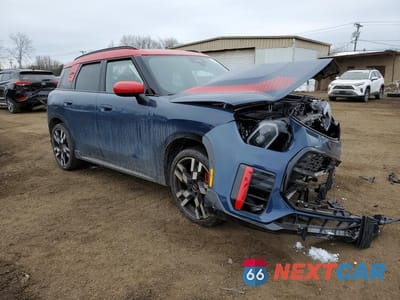 Czwarte zdjęcie samochodu z boku: 2025 MINI COUNTRYMAN JCW ALL4 VIN:WMZ33GA05S7R83540 - miniatura