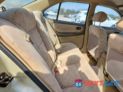 Zdjęcie 10 z 11 samochodu: 1999 NISSAN ALTIMA XE VIN:1N4DL01DXXC240570 - miniatura