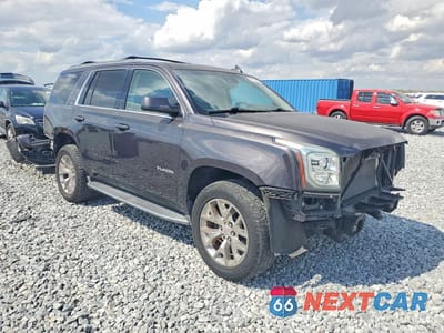 Czwarte zdjęcie samochodu z boku: 2016 GMC YUKON SLT VIN:1GKS2BKCXGR324766 - miniatura