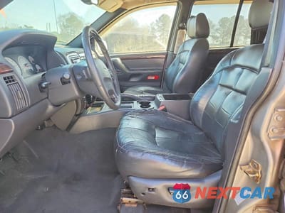 Zdjęcie 7 z 13 samochodu: 2001 JEEP GRAND CHEROKEE LIMITED VIN:1J4GX58N51C628797 - miniatura