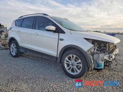 Czwarte zdjęcie samochodu z boku: 2018 FORD ESCAPE SEL VIN:1FMCU0HD7JUC06673 - miniatura