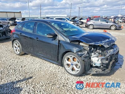 Czwarte zdjęcie samochodu z boku: 2014 FORD FOCUS ST VIN:1FADP3L92EL411422 - miniatura