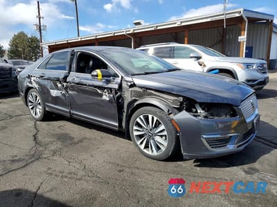 Czwarte zdjęcie samochodu z boku: 2019 LINCOLN MKZ RESERVE II VIN:3LN6L5FC1KR608432 - miniatura