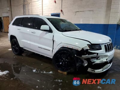 Czwarte zdjęcie samochodu z boku: 2015 JEEP GRAND CHEROKEE OVERLAND VIN:1C4RJFCG3FC159506 - miniatura