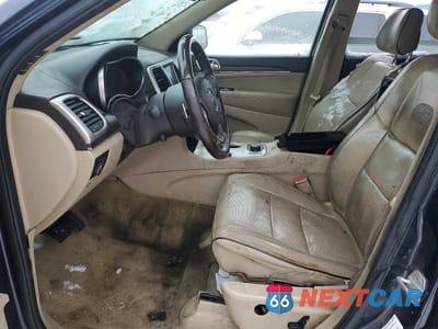 Zdjęcie 7 z 13 samochodu: 2014 JEEP GRAND CHEROKEE OVERLAND VIN:1C4RJFCG6EC181367 - miniatura