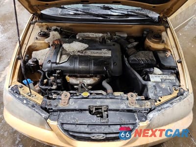 Zdjęcie 11 z 12 samochodu: 2004 HYUNDAI ELANTRA GLS VIN:KMHDN46D14U745290 - miniatura