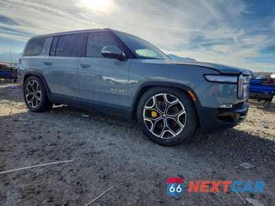 Czwarte zdjęcie samochodu z boku: 2022 RIVIAN R1S LAUNCH EDITION VIN:7PDSGABL1NN002845 - miniatura