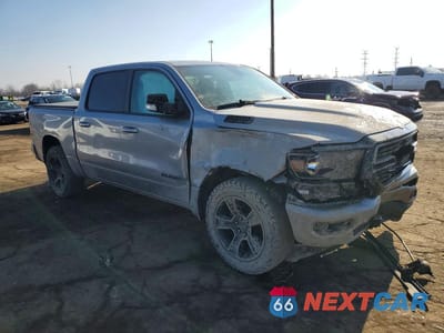 Czwarte zdjęcie samochodu z boku: 2020 RAM TRUCKS 1500 BIG HORN/LONE STAR VIN:1C6SRFFT8LN385406 - miniatura