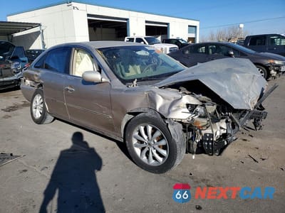 Czwarte zdjęcie samochodu z boku: 2006 HYUNDAI AZERA SE VIN:KMHFC46F96A105039 - miniatura