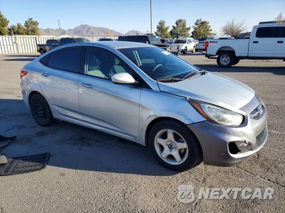 Czwarte zdjęcie samochodu z boku: 2014 HYUNDAI ACCENT GLS VIN:KMHCT4AE6EU707475 - miniatura