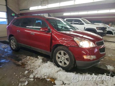Czwarte zdjęcie samochodu z boku: 2012 CHEVROLET TRAVERSE LT VIN:1GNKVGEDXCJ241424 - miniatura