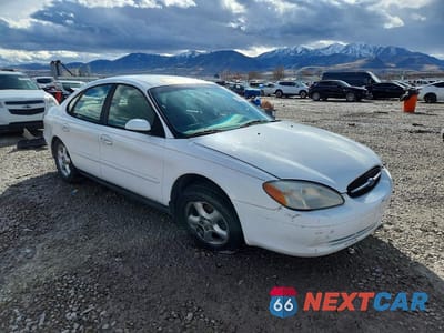 Czwarte zdjęcie samochodu z boku: 2000 FORD TAURUS SES VIN:1FAFP55U5YG232648 - miniatura