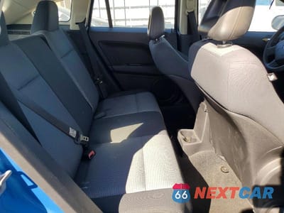 Zdjęcie 11 z 13 samochodu: 2009 DODGE CALIBER SXT VIN:1B3HB48A99D156739 - miniatura