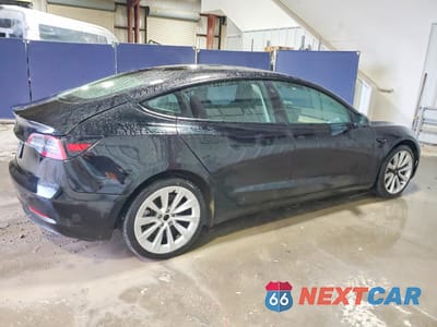 Trzecie zdjęcie samochodu z tyłu: 2023 TESLA MODEL 3 VIN:5YJ3E1EA0PF448675 - miniatura
