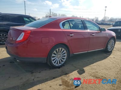 Trzecie zdjęcie samochodu z tyłu: 2013 LINCOLN MKS VIN:1LNHL9EK8DG618829 - miniatura