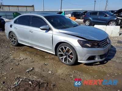 Czwarte zdjęcie samochodu z boku: 2016 VOLKSWAGEN PASSAT SE VIN:1VWBT7A3XGC010140 - miniatura