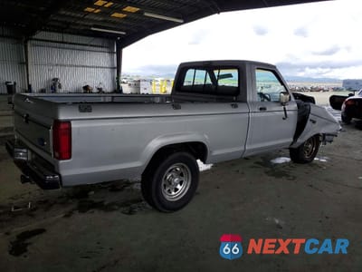 Trzecie zdjęcie samochodu z tyłu: 1989 FORD RANGER VIN:1FTCR10T9KUA39412 - miniatura